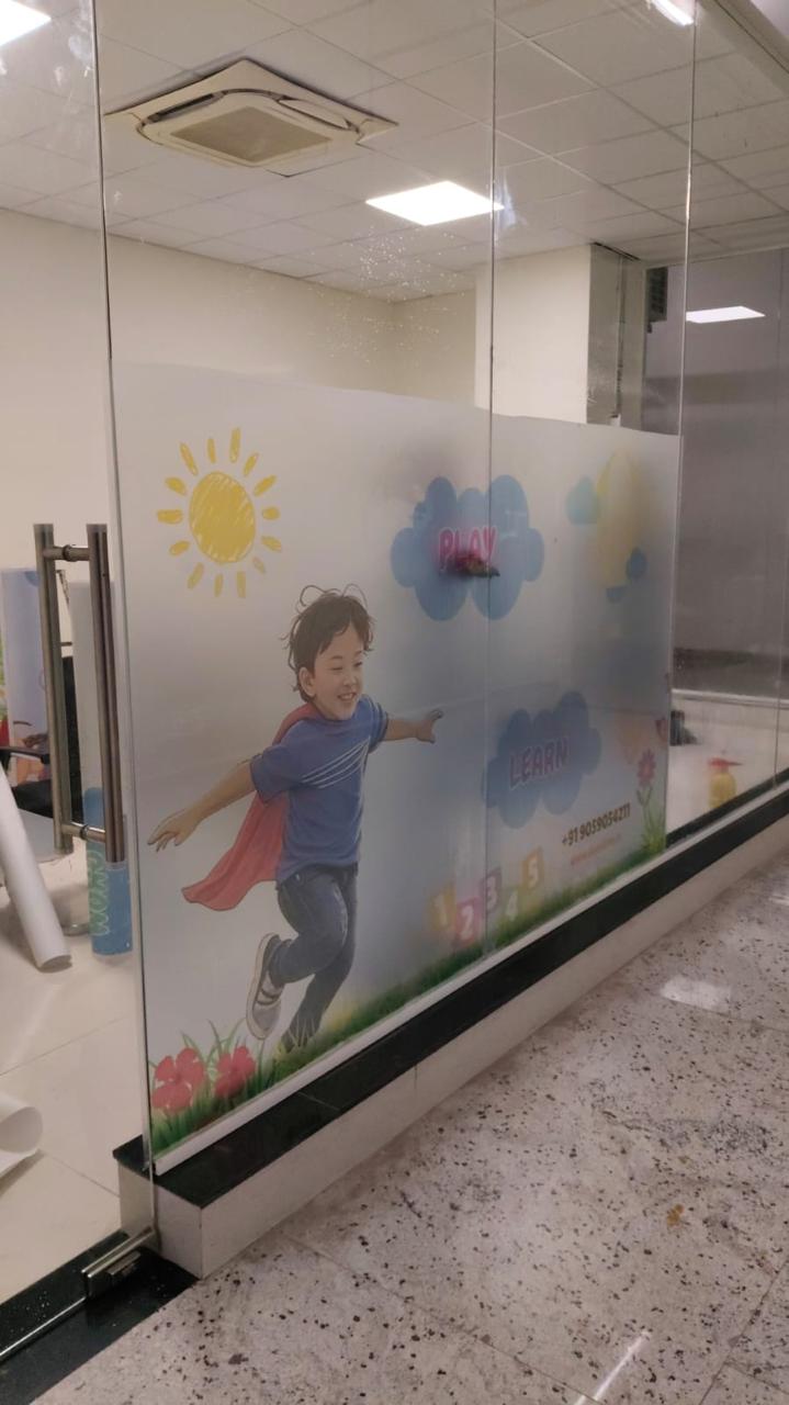 The Play and Learn artwork along the Doon Kids entrance